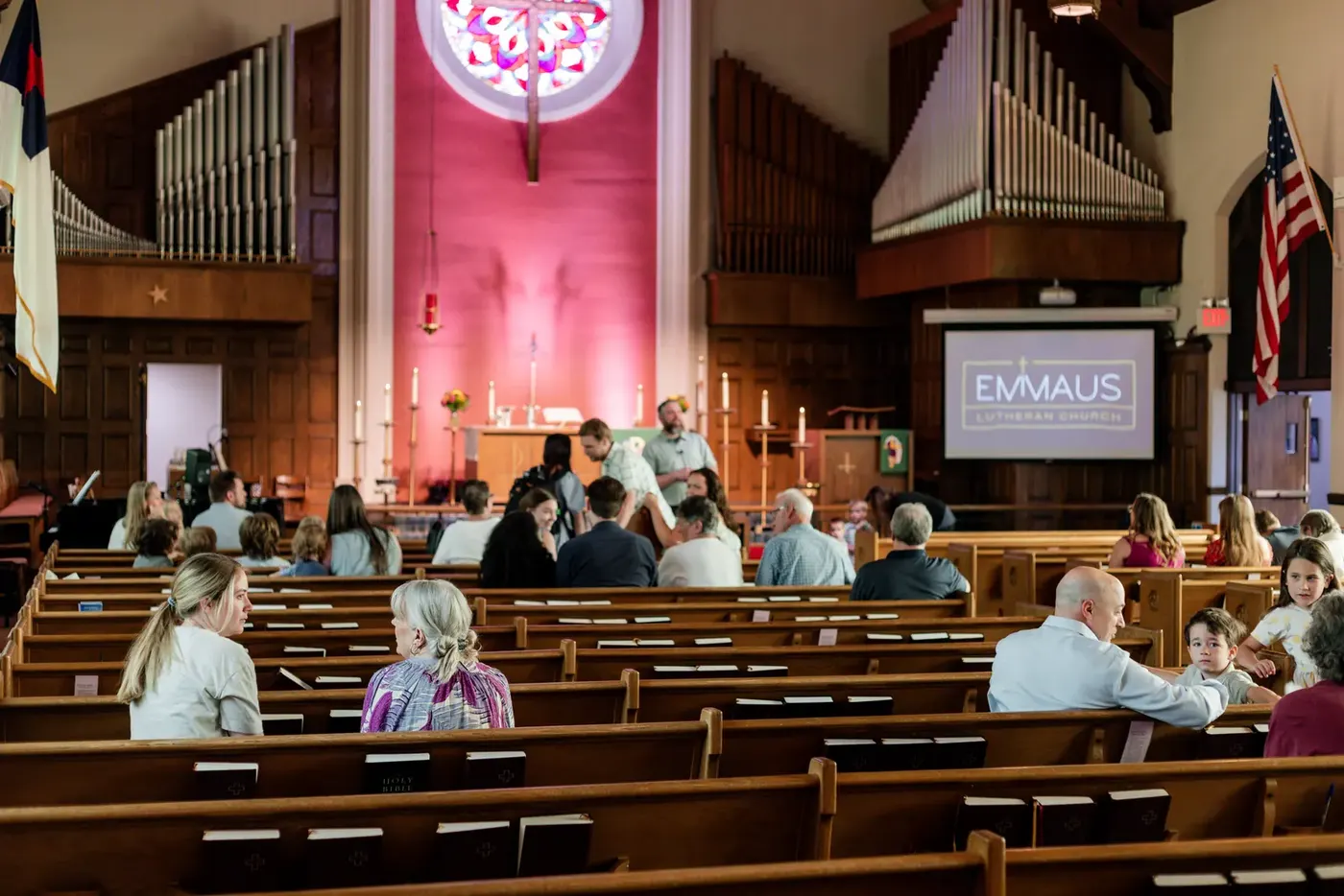 The congregation seated for Sunday worship at Emmaus